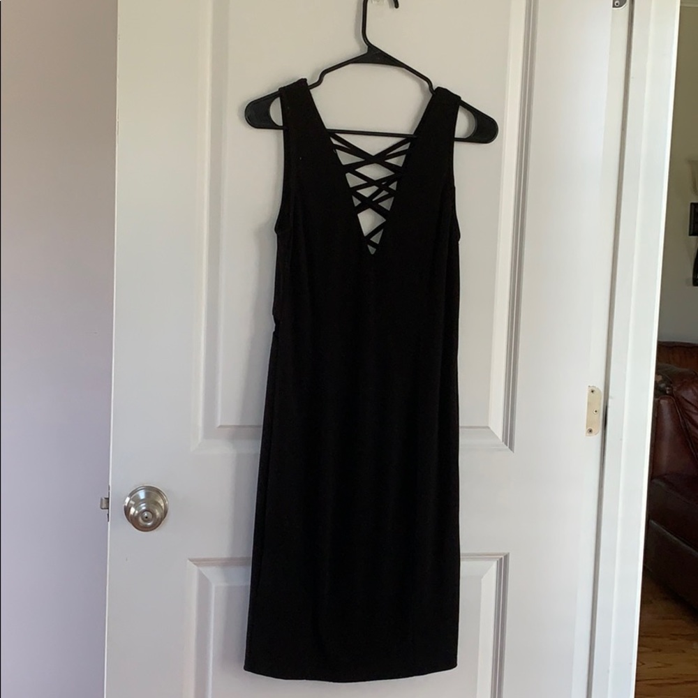 Black very flattering dress, beautiful back